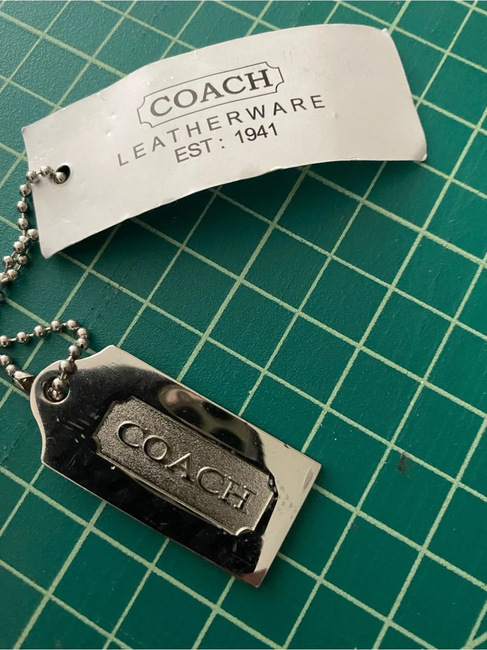 Vintage Coach metal hang tag bag charm